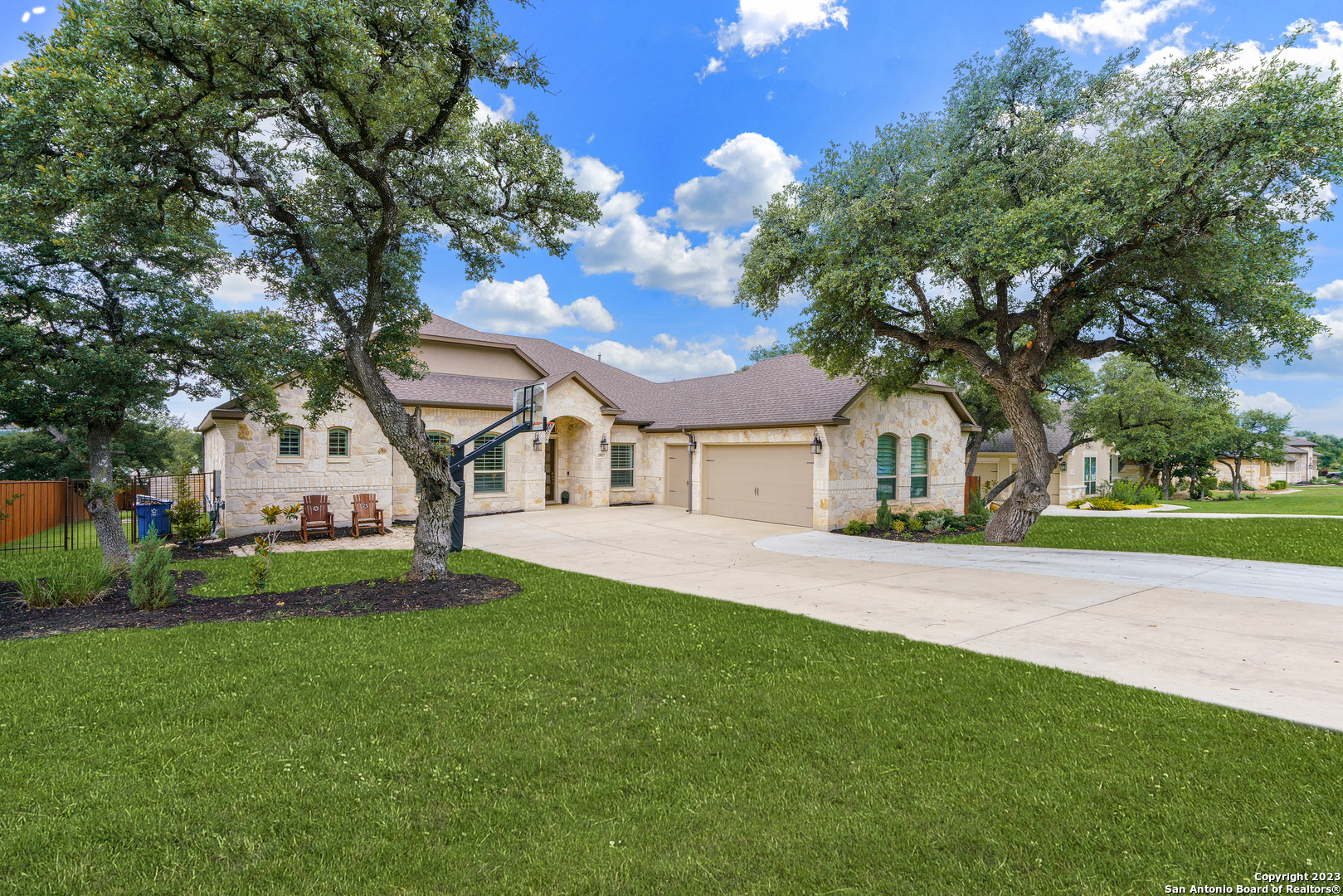 28827 Balcones Crk Boerne TX 78006 single-story Sitterle home with pool spa Hill Country views gated Balcones Creek featured by Rise Property Group