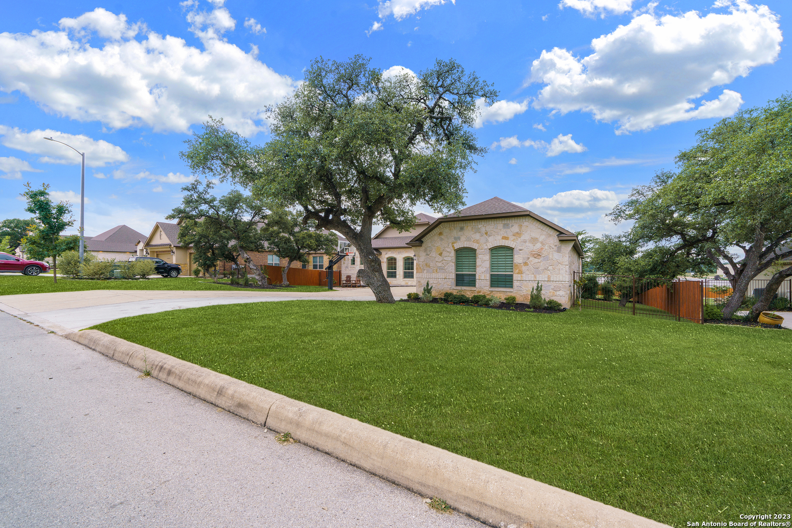 28827 Balcones Crk Boerne TX pool spa Hill Country views lush landscaping backyard resort outdoor living