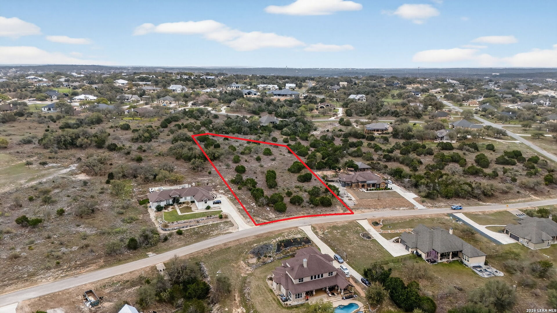 1634 Decanter New Braunfels TX wooded homesite gently sloping terrain mature trees Hill Country views Vintage Oaks at the Vineyard