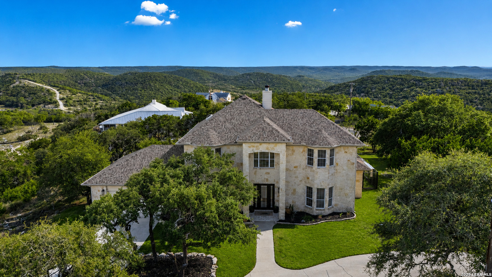 103 High Sierra Dr Boerne TX 78006 Deep Hollow luxury home with Hill Country views and heated pool featured by Rise Property Group