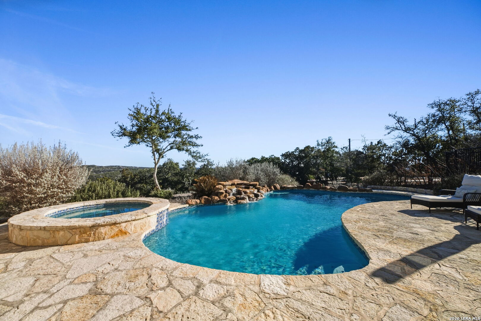 103 High Sierra Dr Boerne TX open concept living renovated kitchen stone fireplace Hill Country interior