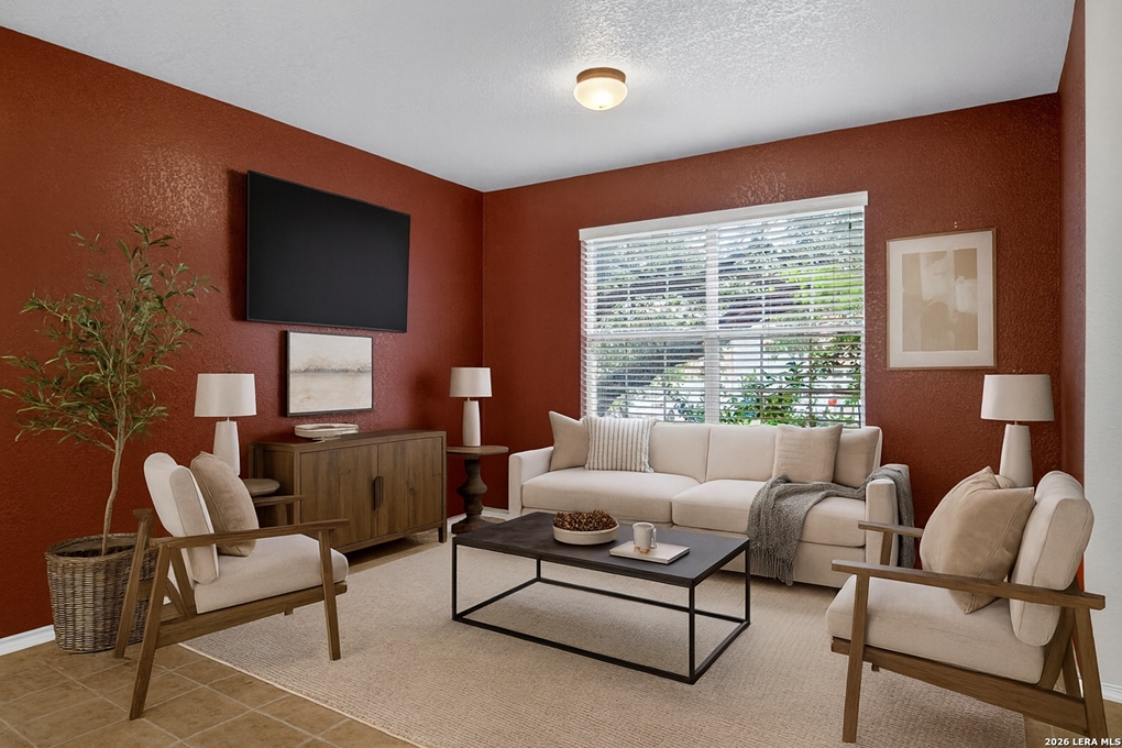 8111 Cooper Corral Cir San Antonio TX open concept living kitchen island family room interior