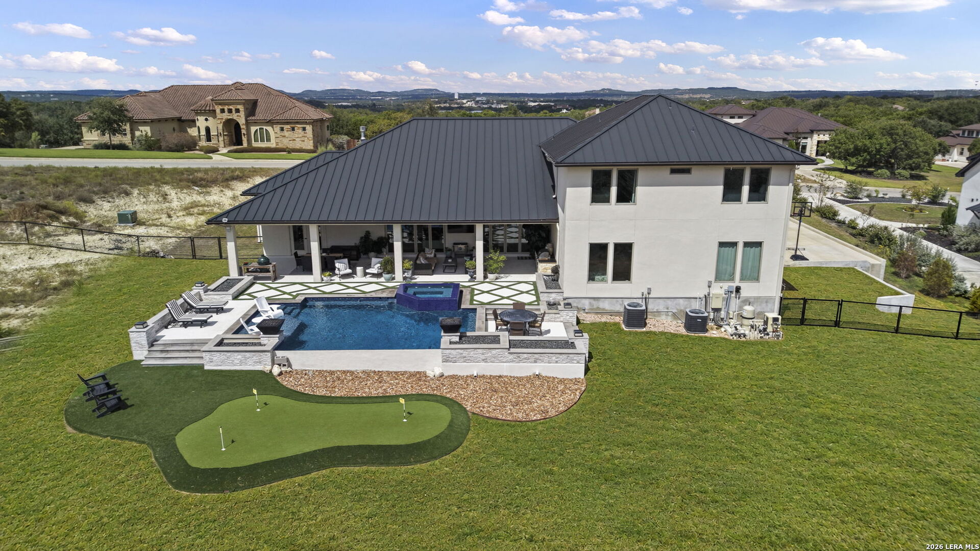 117 Miller Springs Boerne TX heated pool spa outdoor kitchen covered patio special lighting Menger Springs estate backyard resort