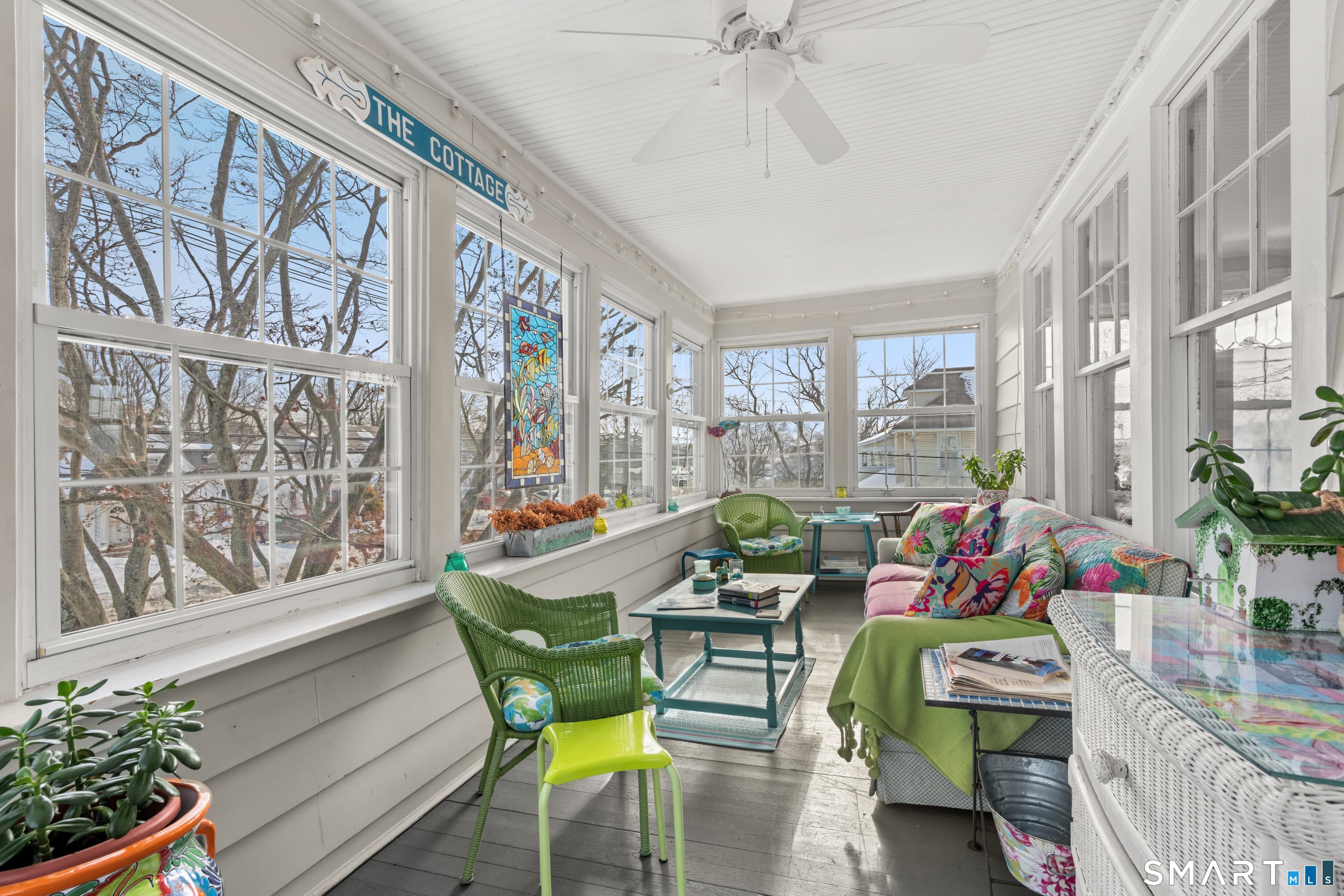Enclosed sunporch on second floor