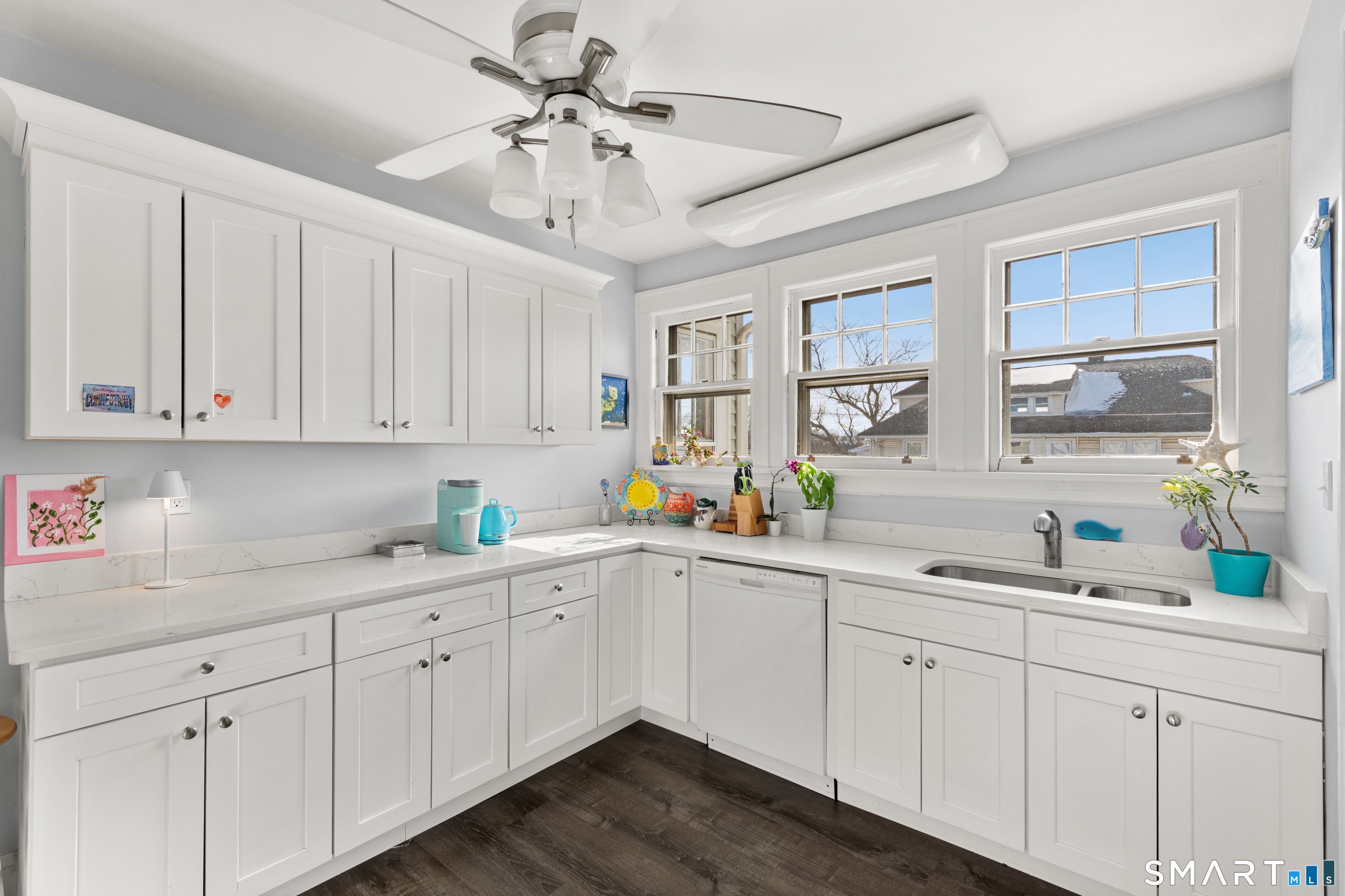Second floor kitchen with white cabinets